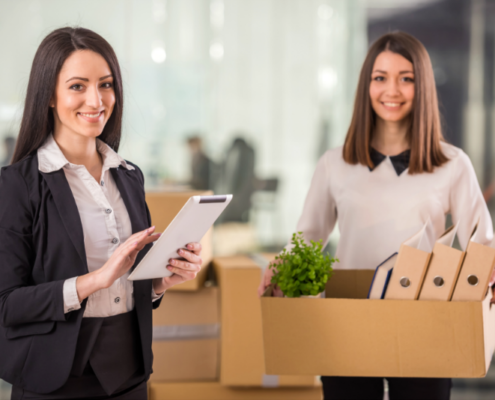 Businesswomen with Moving Boxes | 3GuysMoving.com