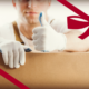 Mover with Box Giving Thumbs Up | 3GuysMoving.com