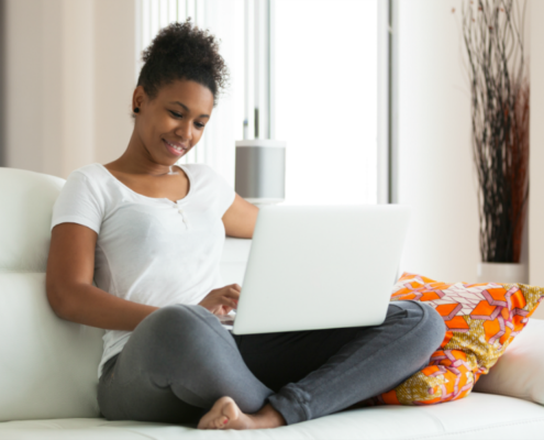Woman Using Laptop | 3GuysMoving.com