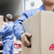 3GuysMoving November Blog 1 Movers Removing Boxes from Moving Truck | 3GuysMoving.com