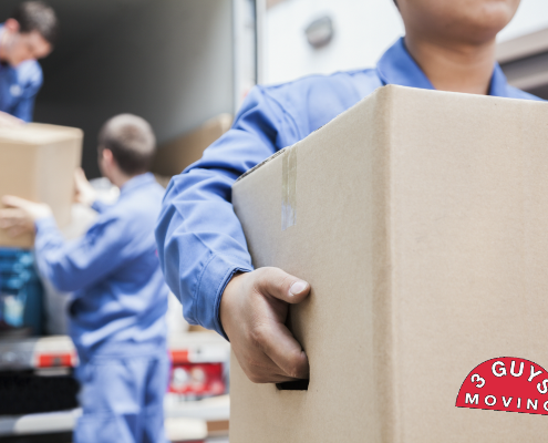 Movers Removing Boxes from Moving Truck | 3GuysMoving.com