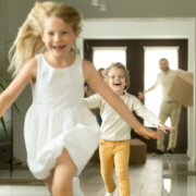 3 guys moving december blog kids Two Children Running into New House Followed by Parents | 3GuysMoving.com