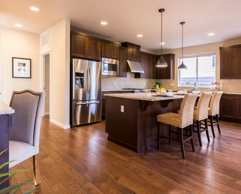Clean Kitchen with Fridge and Island | 3GuysMoving.com