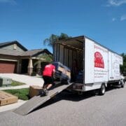 Carefully Loading Items into Moving Truck Carefully Loading Items into Moving Truck